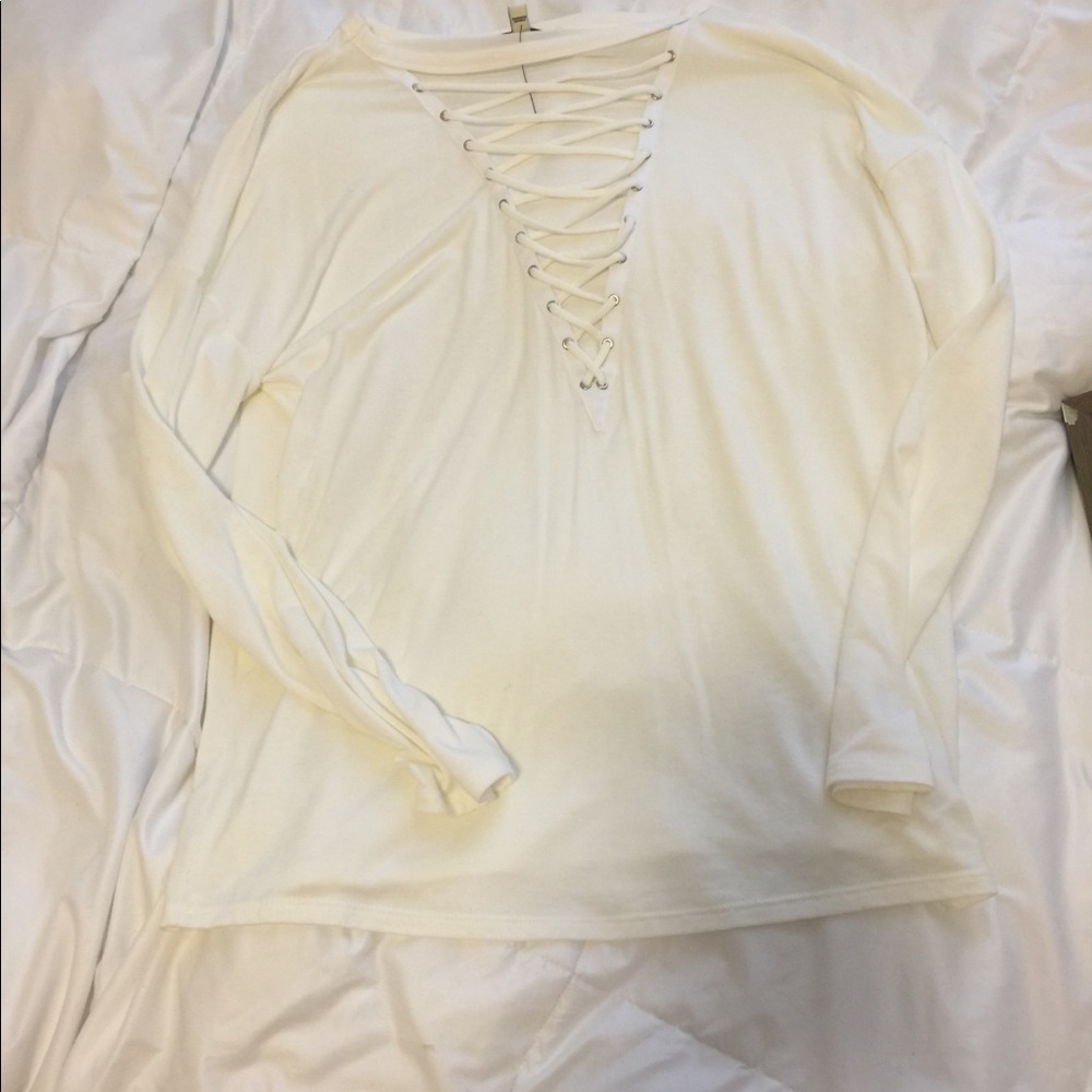 Super low cross front tee